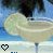 Animated sequence of a cocktail glass with lime garnish against blue sky background, showing text and heart symbol changes.