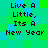 Pixelated text 'Live A Little, Its A New Year' repeated in a pattern on a green and blue checkered background