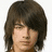Pixelated portrait of a person with long dark hair on left, pink text and heart symbols on right.