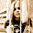 Animated contact sheet of a 48x48 pixel AOL buddy icon featuring Avril Lavigne with repeated text elements, displayed in a 3x2 grid layout on a gray background.