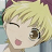 A pixelated anime-style character with blonde hair and a purple headband on the left, next to black background text reading "Anime IM" above smaller "COM" text on the right.