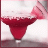 Static image of a red cocktail glass with dark liquid, set against light background and brown border.