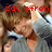 Pixelated image of a person with light skin and brown hair wearing a gray shirt, overlaid with red text reading "zoc efron" in blocky font.