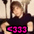 A person in a dark shirt with light-colored collar sits against a light patterned background, with <333 text in various colors overlaid.