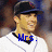 A pixelated image of a person in a baseball uniform with a dark cap, white jersey, and black collar, showing two text variations.