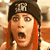 A 2x2 contact sheet of three animated frames showing characters with exaggerated shocked expressions in a movie scene, displayed on a gray background.