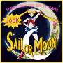 Sailor Moon character in blue-and-white sailor uniform with red accents, holding golden staff, standing on crescent moon against dark blue background with pink text and floral border.