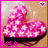 Animated pink heart-shaped icon with white daisy patterns, displaying text 'LOLA' in pixelated font at bottom left and a small heart symbol top right.