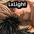 Pixelated image with 'LxLight' text overlay on a blurred background featuring indistinct shapes and colors.