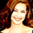Static 48x48 pixel icon showing a smiling woman with reddish-brown hair against dark background, rendered in low-resolution pixel art style with visible dithering and color blending.