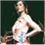Pixelated image of a person in profile view wearing white top and blue lower garment against dark background.