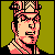 Pixelated character portrait with pinkish-red and black color scheme against olive-green background, featuring a stylized headpiece and facial features in retro 8-bit style.