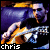 Pixelated static icon featuring a stylized figure with flowing hair and dynamic pose against dark background, with text "chris" at bottom.