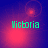 Green pixelated text 'Victoria' on a blue-to-red gradient background with shifting red circular light effects.