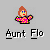 Pixelated character with brown hair, blue eyes, red lips, wearing pink and yellow checkered sweater over black garment on gray background.