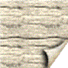 A static image of a white brick wall with curled paper corners, featuring an orange folded object on the right side.