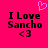 A bright pink background displays black pixelated text reading "I Love Sancho <3" with a small purple heart symbol above the left side of the text.
