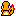 Pixel art of an orange creature with blue eyes and black outlines, holding a red-and-yellow flame in its right hand against a gray background.