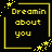 Yellow pixelated text "Dreamin about you" inside a yellow frame with star sparkles on black background.