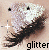 Pixelated image of a stylized figure with white hair and dark clothing, featuring a crosshair cursor and the word 'glitter' at the bottom.