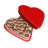 Red heart-shaped box with open lid revealing chocolates; one chocolate is animated to move from the bottom left toward the top right across frames.