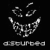 Pixelated grayscale icon featuring a stylized face with sharp teeth and floating fragments above, with the word "disturbed" in blocky text below on black background.