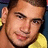 A person in a yellow shirt appears across four with varying head angles and background colors
