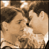A sequence of sepia-toned frames showing a couple kissing in various poses and angles.