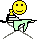 Pixelated yellow smiley face avatar with black outline, light green pants, and black-and-white striped shirt, seated at table with crossed legs, hand near face in four sequential poses.