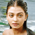Static 50x50 pixel icon showing a close-up of a person's face with dark hair, light skin tone, and visible facial features against a blurred background.