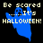 Pixelated blue ghost with raised arms appears over black background, text reads 'Be scared .....It's HALLOWEEN!' in yellow block letters.