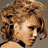 A 2x2 contact sheet of four pixelated frames showing a woman with curly hair in different poses and expressions, alongside a black panel with "Coolbuddy.com" text.
