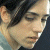 A 50x50 pixel buddy icon split into two frames showing a person's profile on the left and green text "Original Icons .com" on a dark background on the right, with visible pixelation and dithering effects.