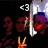< 3 with red and purple shapes on black background, orange flame-like element below.