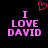 Pixelated pink text "I LOVE DAVID" on black background with a pixelated heart above the left side of the text.