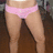 Pixelated close-up of a person's lower torso wearing pink underwear and brown pants, cropped at the waist.