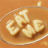 Pixelated icon shows light-colored, irregularly shaped objects on a rounded plate against an orange background.