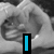 A four- shows a grayscale image of hands forming a heart shape, pink text reading "LoVe," green text reading "RoCkY," and a brown textured background with white edges