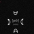 Pixelated grayscale icon with four distinct shapes arranged vertically on a black background: a U-shaped top element, a central horizontal bar flanked by curved side elements, and an A-shaped bottom element.