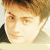 A 50x50 pixel animated contact sheet showing two frames of a Daniel Radcliffe character with brown hair, green eyes, and a red heart symbol in the bottom-right corner.
