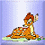 Pixelated cartoon deer with brown and orange fur, white underbelly, and black spots, sitting on green grass against a light blue background.