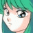 Anime-style character with green hair and blue eyes on left, black background with white text on right.