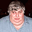 A pixelated image of a person in a gray shirt with text reading "what are you talking about" and "DON VITO" on blue backgrounds