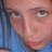 A pixelated image of a person with blue hair, showing two distinct text overlays: 'gabi' in red and '3' in green.
