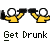 Pixelated static image of two yellow stick figures with white circular heads holding black objects above their heads, below which is pixelated text reading "Get Drunk" on a gray background.