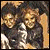 Pixelated image of three figures with two in the foreground and one behind, below text reading "I SUPPORT Harry ♡ Hermione" on white background.