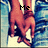 A pixelated image of two hands holding each other, with text labels 'Me' and 'You' over the hands in different frames.
