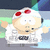 Pixelated cartoon character with light skin, red mushroom cap, white lab coat, and black belt, standing against a multi-colored background.