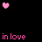 Animated contact sheet of 8 frames showing pink pixelated hearts floating above repeated "in love" text on a black background with gray transparency indicator.