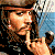 A 4-frame contact sheet of a pixelated animated icon featuring Johnny Depp as Captain Jack Sparrow from Pirates of the Caribbean, showing subtle facial expression changes across frames with consistent pose and background elements.
